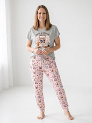 Women wearing cozy knit two-piece pajama set with French Bulldog and coffee graphic print in pink and gray