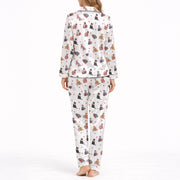 Women's pajama set with a cute cat and heart pattern on a white background, featuring various colored cats holding red hearts, perfect for pet lovers and cozy sleepwear.