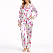 Women's pajama set featuring a vibrant pink and purple gymnast silhouette pattern on a white background, showcasing various athletic poses.