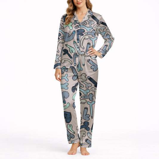 Women's pajama set with an all-over playful cartoon penis pattern in blue, grey, and teal colors on a light background, featuring a short-sleeve button-down top and matching shorts.