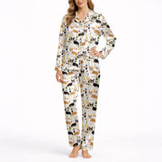 Women's pajama set featuring a fun and whimsical pattern of cute corgi dogs, wine bottles, wine glasses, beer glasses, and martini cocktails on a white background, perfect for pet lovers and relaxation.