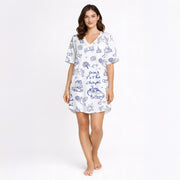 Women's short sleeve button down pajama set with shorts featuring a blue and white wedding doodle pattern including chapels, wedding cars, rings, doves, cakes, and 'Going To The Chapel' text.