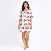 Woman wearing a white short sleeve button-down pajama set with red piping, featuring a fun basketball, sneaker, and hoop pattern.