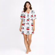 Women's pajama set with a repeating pattern of cute cartoon bulldogs wearing red sweaters on a white background, perfect for dog lovers.