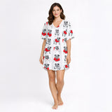 Women's pajama set with a repeating pattern of cute cartoon bulldogs wearing red sweaters on a white background, perfect for dog lovers.