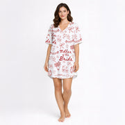 Women's Mother of the Bride pajama set with red hand-drawn wedding motifs on white fabric, including ballet slippers, champagne flutes, doves, and hearts.