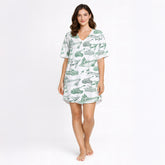 Women's pajama set featuring a unique green sketch pattern of military vehicles including tanks, warships, fighter jets, and helicopters on a white background, perfect for comfort and style.