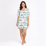 Women's pajama set featuring a unique green sketch pattern of military vehicles including tanks, warships, fighter jets, and helicopters on a white background, perfect for comfort and style.
