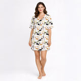 Women's pajama set featuring a fun and whimsical pattern of cute corgi dogs, wine bottles, wine glasses, beer glasses, and martini cocktails on a white background, perfect for pet lovers and relaxation.