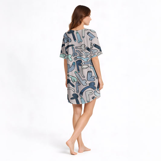 Women's pajama set with an all-over playful cartoon penis pattern in blue, grey, and teal colors on a light background, featuring a short-sleeve button-down top and matching shorts.