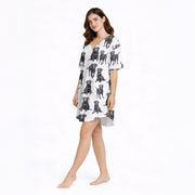 Women's pajama set featuring an all-over print of black Labrador Retrievers, made from soft knit fabric, perfect for dog lovers.