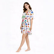 Women's pajama set featuring a vibrant Puerto Rico themed pattern with flags, coqui frogs, palm trees, and musical instruments on a white background.