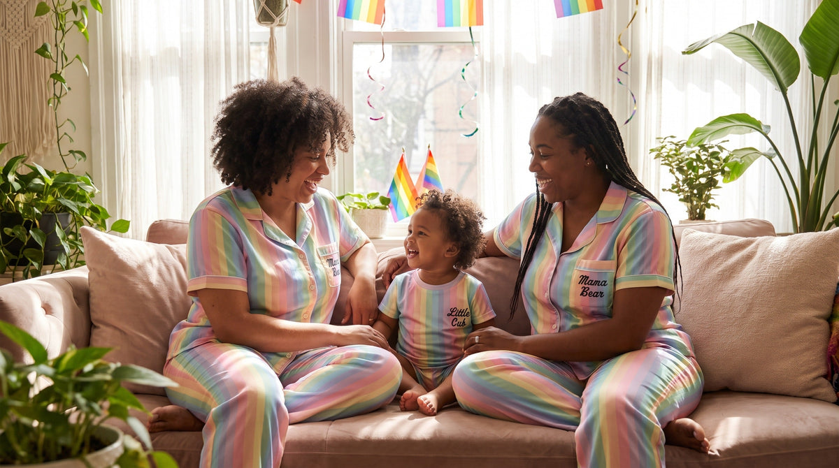 Queer family wearing Pride matching AOP sets with Mama Bear Papa Bear Little Cub designs