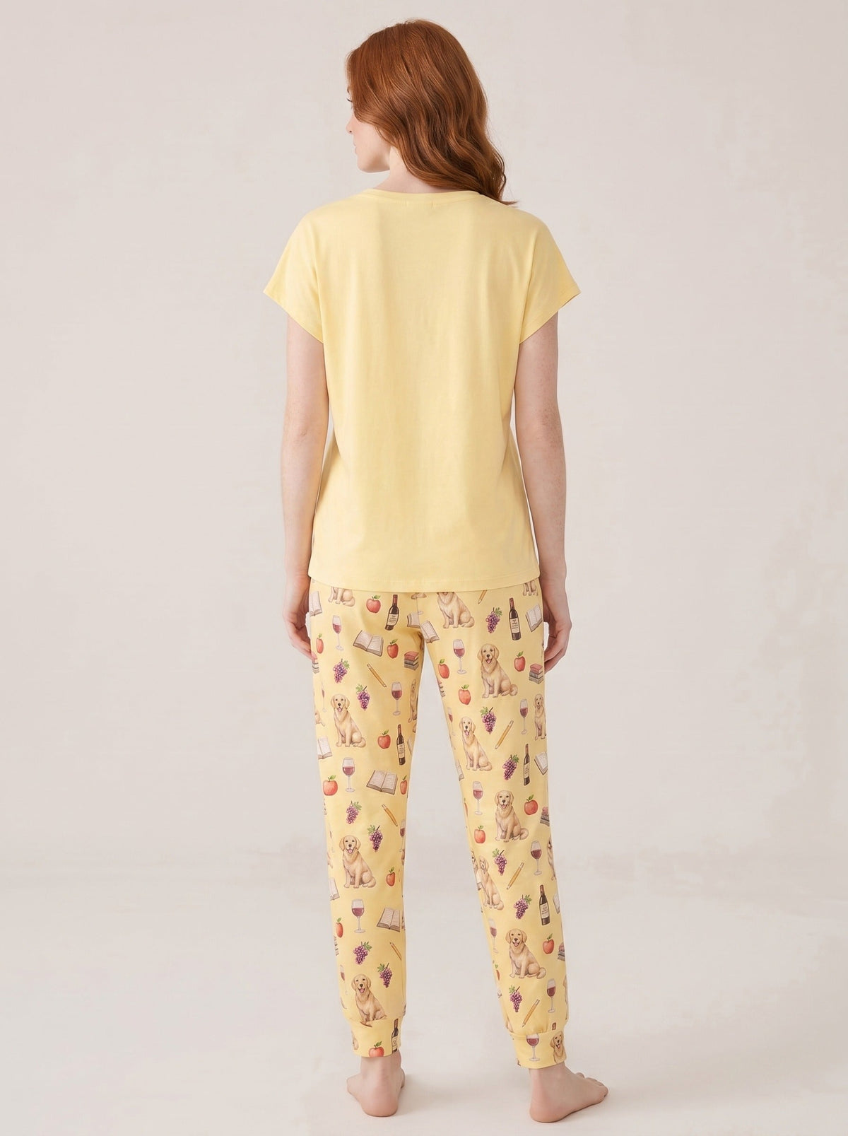 Women's golden retriever teacher pajama set, light yellow soft knit tee with graduation cap dog graphic and AOP jogger pants