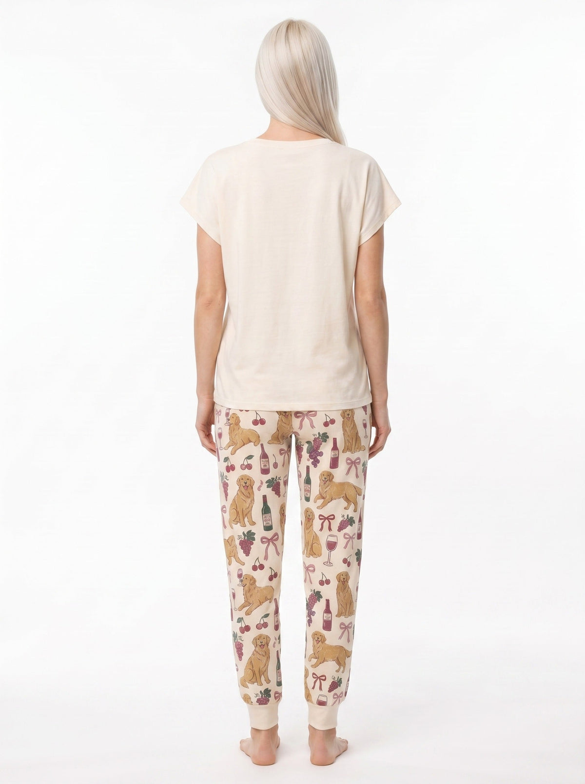 Women's soft knit pajama set with golden retriever wine graphic tee and all-over print jogger pants, cream and dusty rose palette