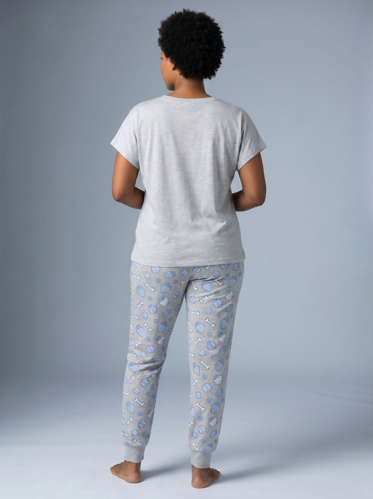 Women's light gray knit pajama set with cartoon poodle sunglasses graphic tee and strawberry paw print AOP jogger pants