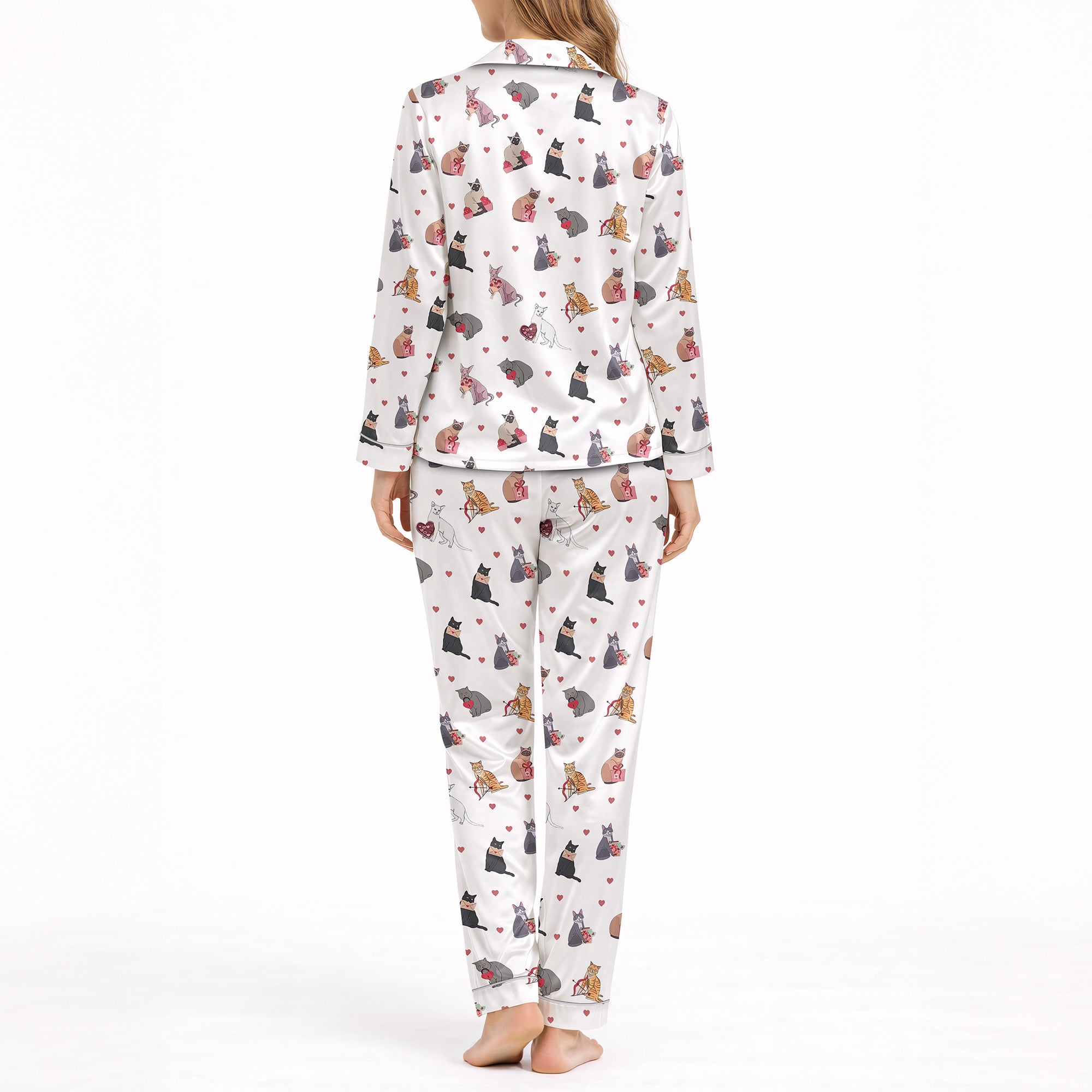 Women's pajama set with a cute cat and heart pattern on a white background, featuring various colored cats holding red hearts, perfect for pet lovers and cozy sleepwear.