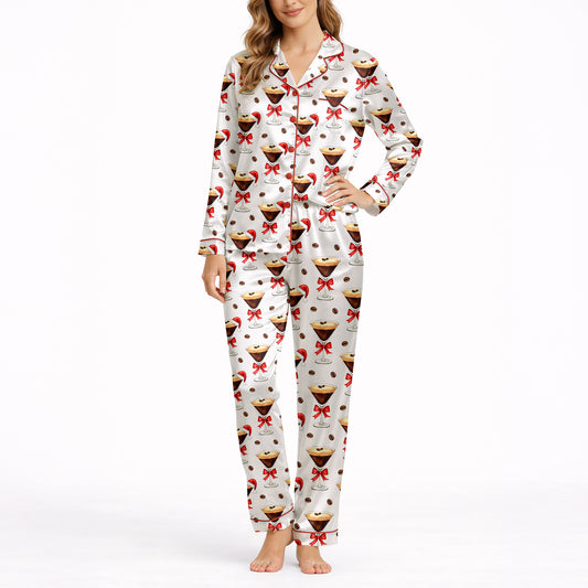 Women's pajama set featuring a festive pattern of espresso martinis with Santa hats and red bows, surrounded by coffee beans on a white background.