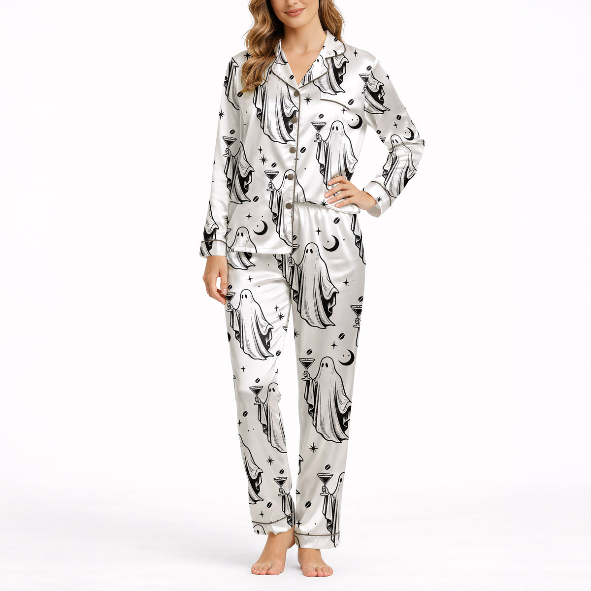 Women's pajama set with a playful black and white ghost pattern, featuring ghosts holding coffee and cocktail glasses, moons, stars, and coffee beans, perfect for comfortable sleepwear.