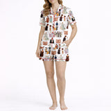 Women's pajama set with a repeating pattern of illustrated Pride and Prejudice characters and book covers, featuring Elizabeth Bennet and Mr. Darcy, on soft knit fabric.