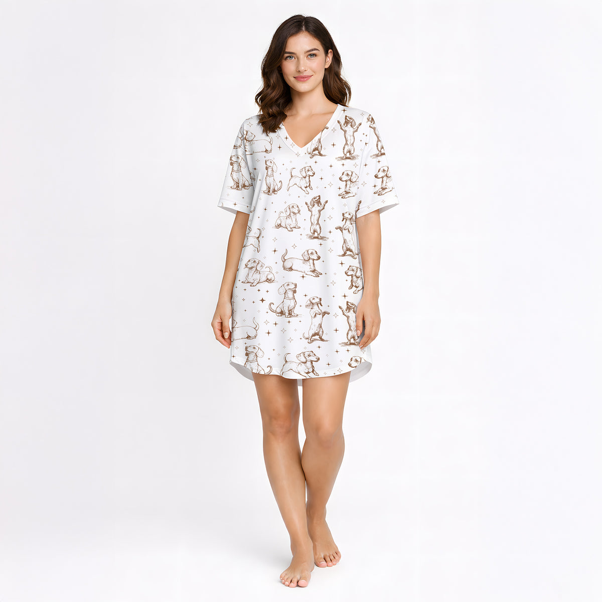 Women's cream pajama set with short sleeves and shorts, featuring a playful sepia-toned Dachshund dog print and small star accents.
