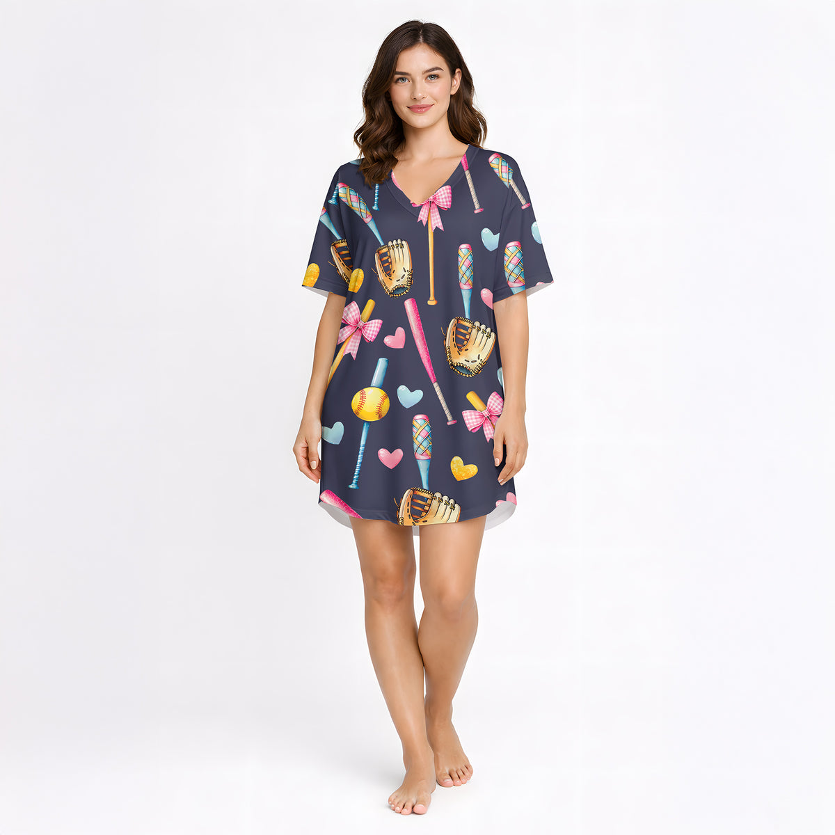 Women's navy blue pajama set with a cute softball and baseball pattern featuring bats, gloves, softballs, hearts, and bows, made from soft knit fabric.