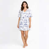 Women's short sleeve button down pajama set with shorts featuring a blue and white wedding doodle pattern including chapels, wedding cars, rings, doves, cakes, and 'Going To The Chapel' text.