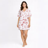 Women's Mother of the Bride pajama set with red hand-drawn wedding motifs on white fabric, including ballet slippers, champagne flutes, doves, and hearts.