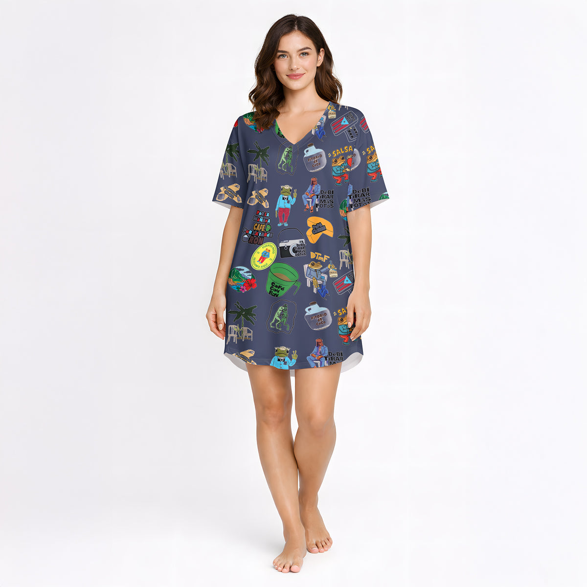 Women's pajama set with a vibrant Caribbean-themed pattern featuring Coquí frogs, Salsa hearts, Puerto Rico flag, coffee and rum drinks, palm trees, and cameras on a dark blue background.
