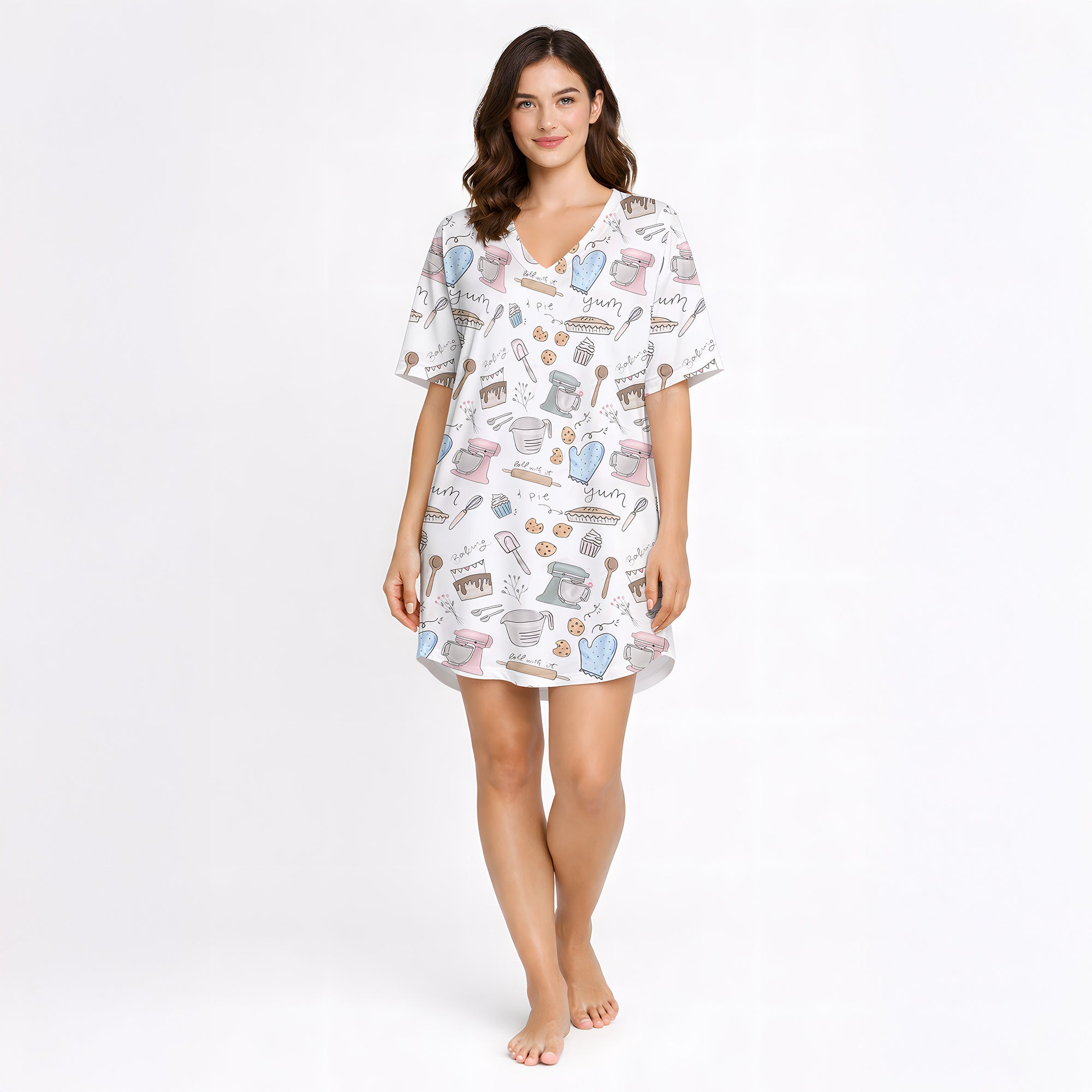 Women's baking-themed pajama set featuring cute illustrations of stand mixers, cupcakes, cookies, and baking tools in pastel colors on a white background.
