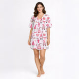 Women's pajama set featuring a charming pink and white watercolor gnome and heart pattern, perfect for Valentine's Day or cozy lounging.