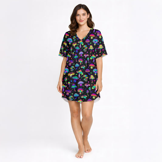 Women's pajama set featuring a vibrant, psychedelic mushroom and star pattern on a black background, showcasing colorful fungi in various shapes and sizes.