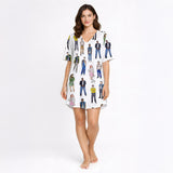 Women's pajama set featuring a unique all-over retro fashion illustration print with stylized figures in 80s and 90s inspired outfits on a white background.