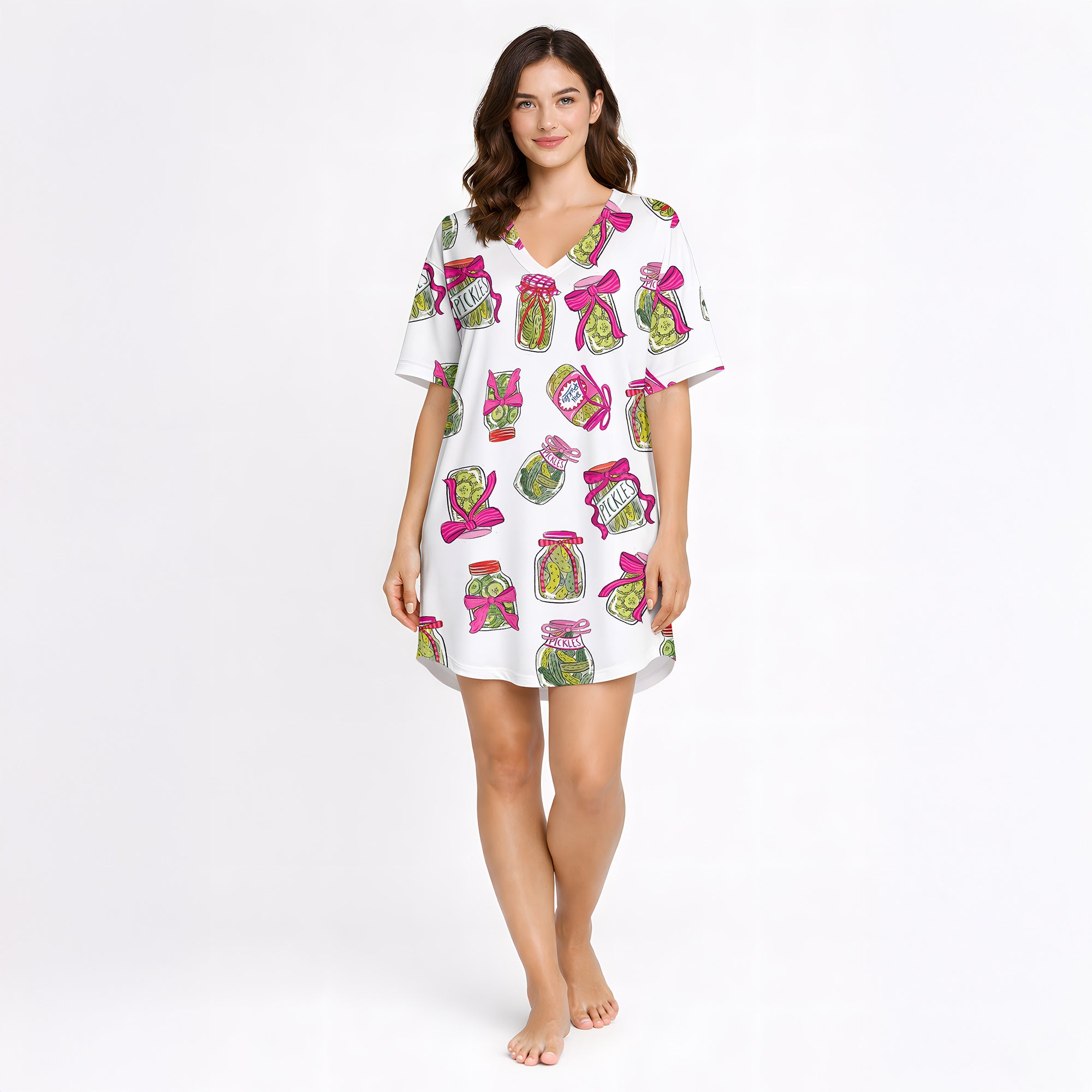 Women's pajama set featuring a fun all-over pickle jar print with pink bows, made from soft knit fabric. Includes a short sleeve button-down top and matching shorts.
