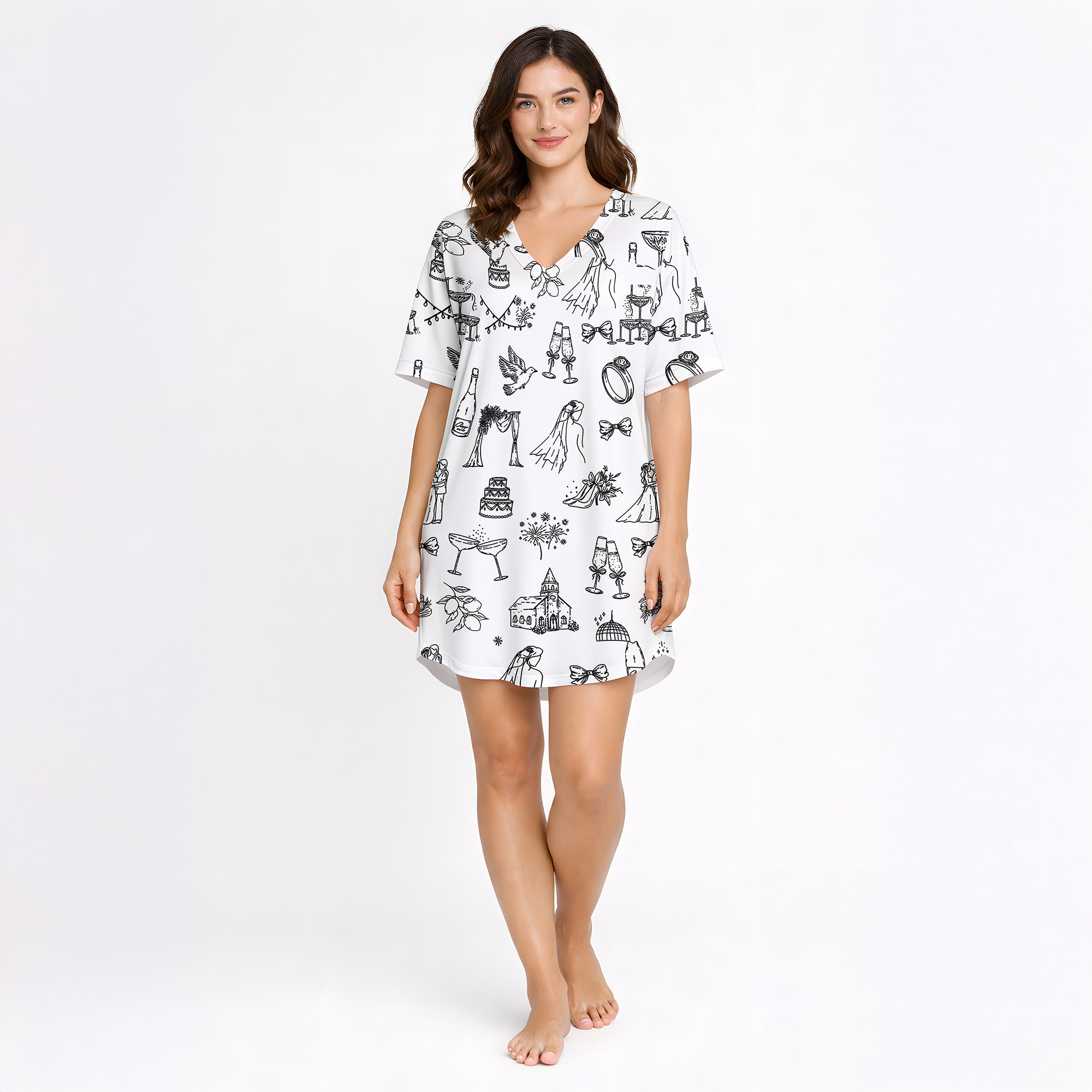 Women's pajama set featuring a black and white hand-drawn wedding doodle pattern with brides, grooms, cakes, rings, and champagne glasses on a white background, perfect for bridal loungewear.