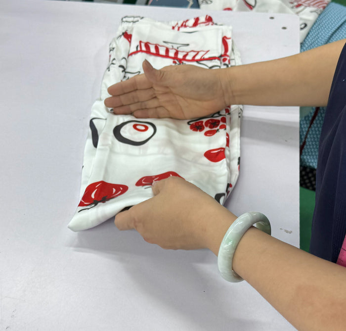 Folded and packed by hand