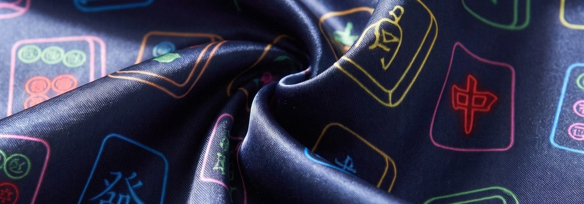 Mahjong pajama fabric close-up — hero banner desktop