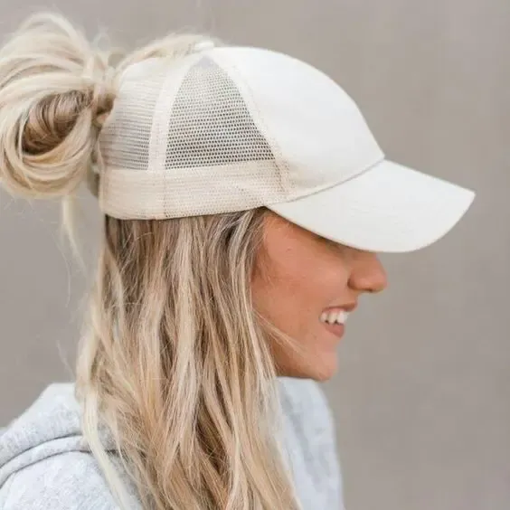 Wear a trucker hat with a Half-Up, Half-Down Hairstyle