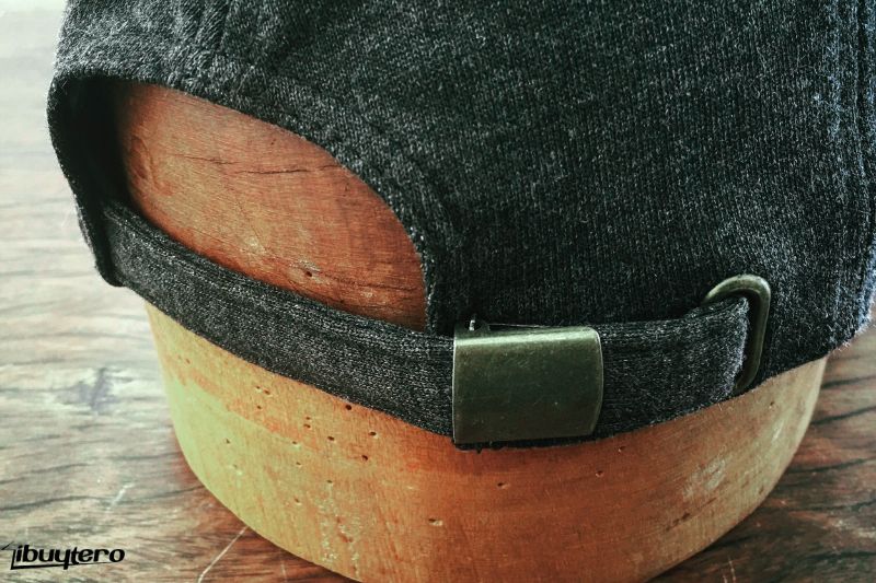 Brass buckle closures are often used in high end or classic hats, such as dad caps