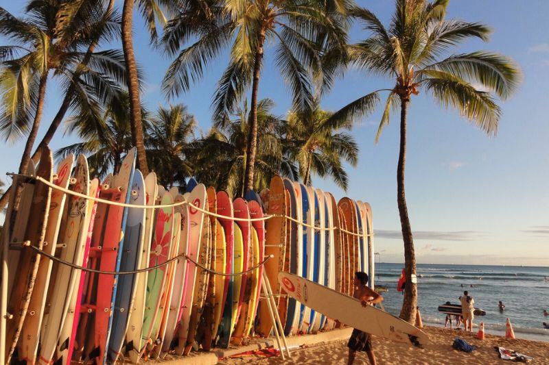 Surfing is an integral part of Hawaiian culture and a must try activity for visitors looking to embrace the islands' adventurous spirit