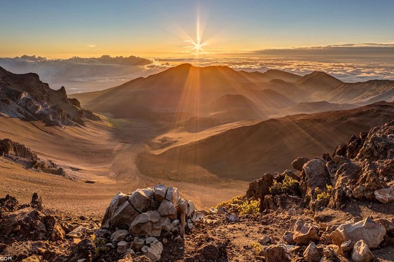 For a once in a lifetime sunrise experience, head to the summit of Haleakalā, 10,000 feet above sea level