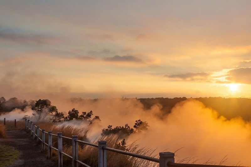 For an utterly unique sunrise experience, make your way to Hawaii Volcanoes National Park and witness the daybreak from the Steam Vents overlooking Halemaʻumaʻu Crater