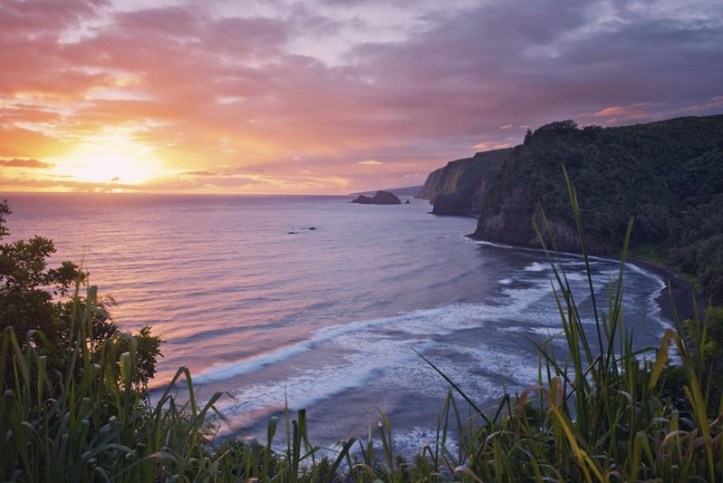 Head to the Pololū Valley overlook for a breathtaking sunrise